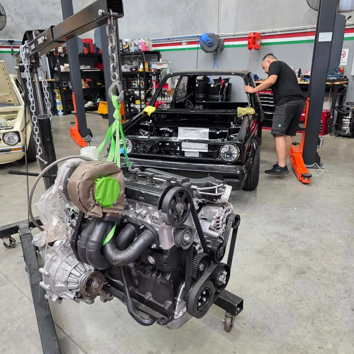 MK1 Golf 16V ABF TURBO Engine dropped in today 🥳

Lots to do still but this is a big step done. Some exciting additions coming soon. A boost in motivation and a clearer path to the end game 👌🏽

Amazing work by everyone that has got us this far. 

