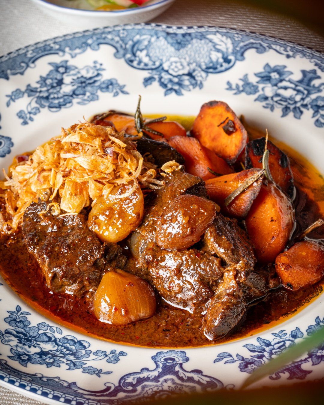 Masaman beef shanks, paired with roasted sweet potato and rosewater ajaad.

#SOMA #MasamanRedefined