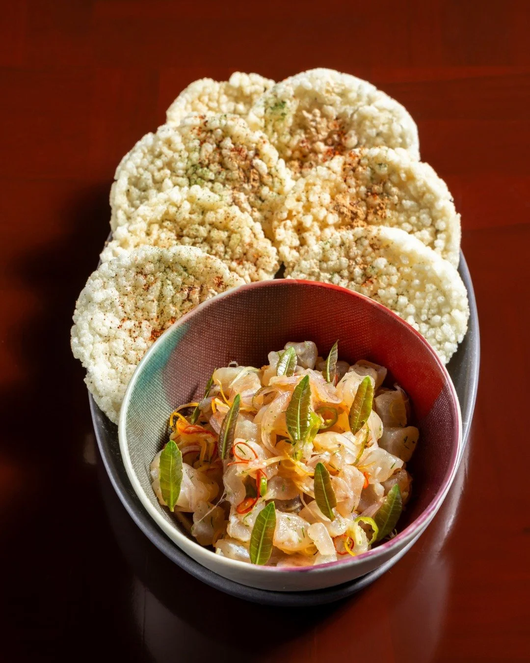 Fish tartare. Crisp rice crackers. You build the bite. 

It's fresh, cool, crunchy, and completely in your hands.

🔗 Reservations via link in bio.
💬 LINE: somabangkok

#SOMABangkok #ThaiSocialKitchen #FreshBite #TexturePlay