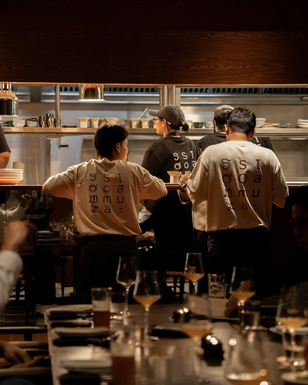 The pass. The silent handoff point. Where a plate gets its final nod before it's yours.