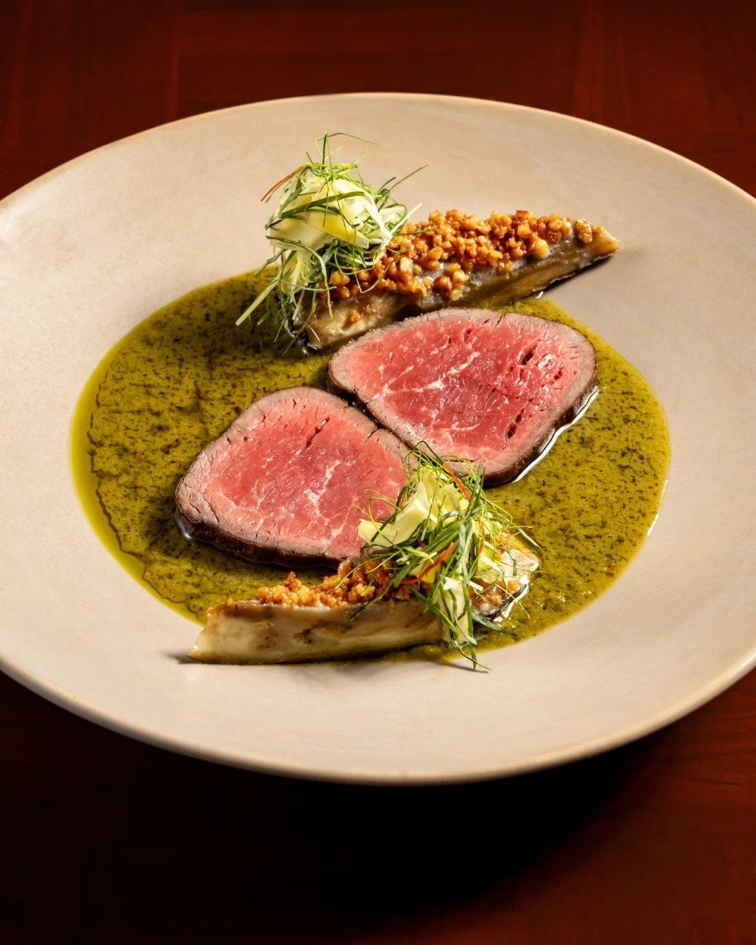You will never find an "ordinary" dish at Soma. Like our steak, which is served with green curry and grilled eggplant.