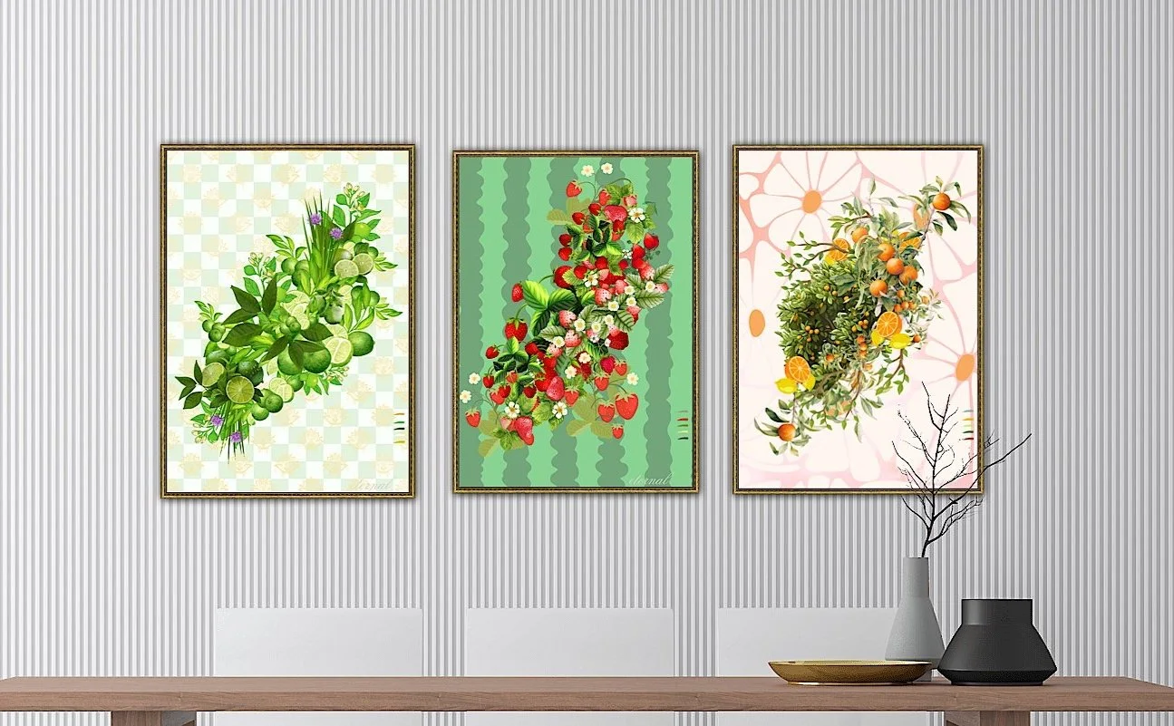 Three framed botanical art prints of citrus, strawberry, and orange trees hanging on a textured gray wall above a wooden table with vases and a branch.