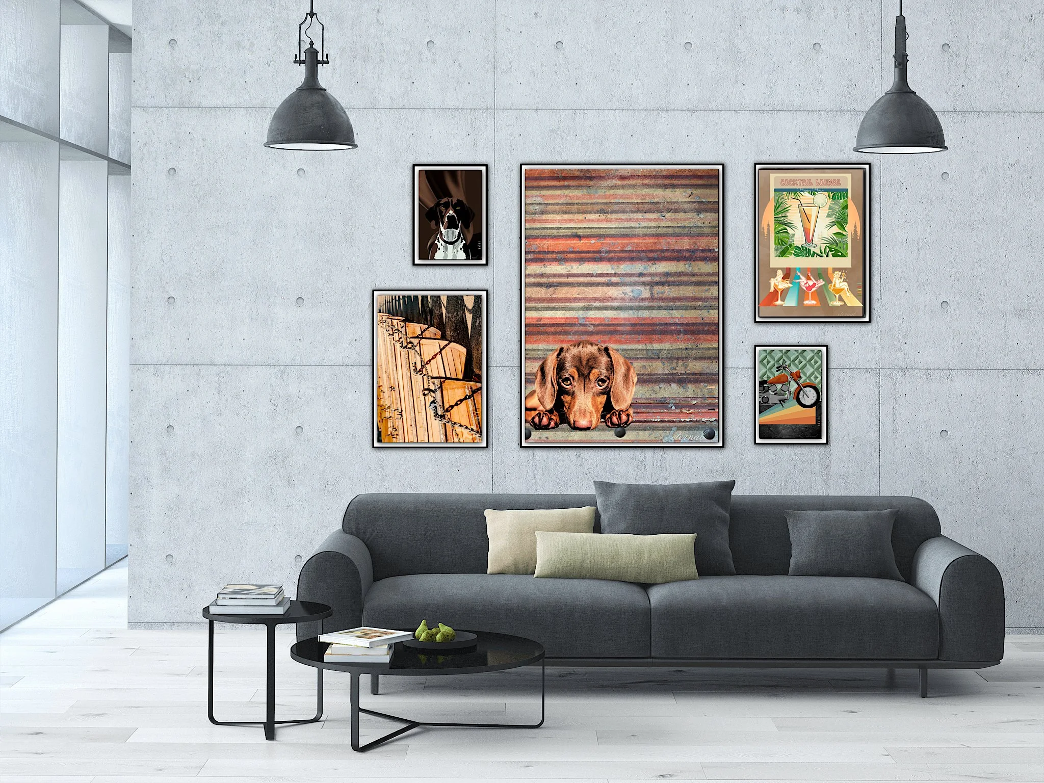 Modern living room with concrete wall, black sofa with throw pillows, and wall art featuring dogs, a wooden deck, a motorcycle, and tropical themed images.
