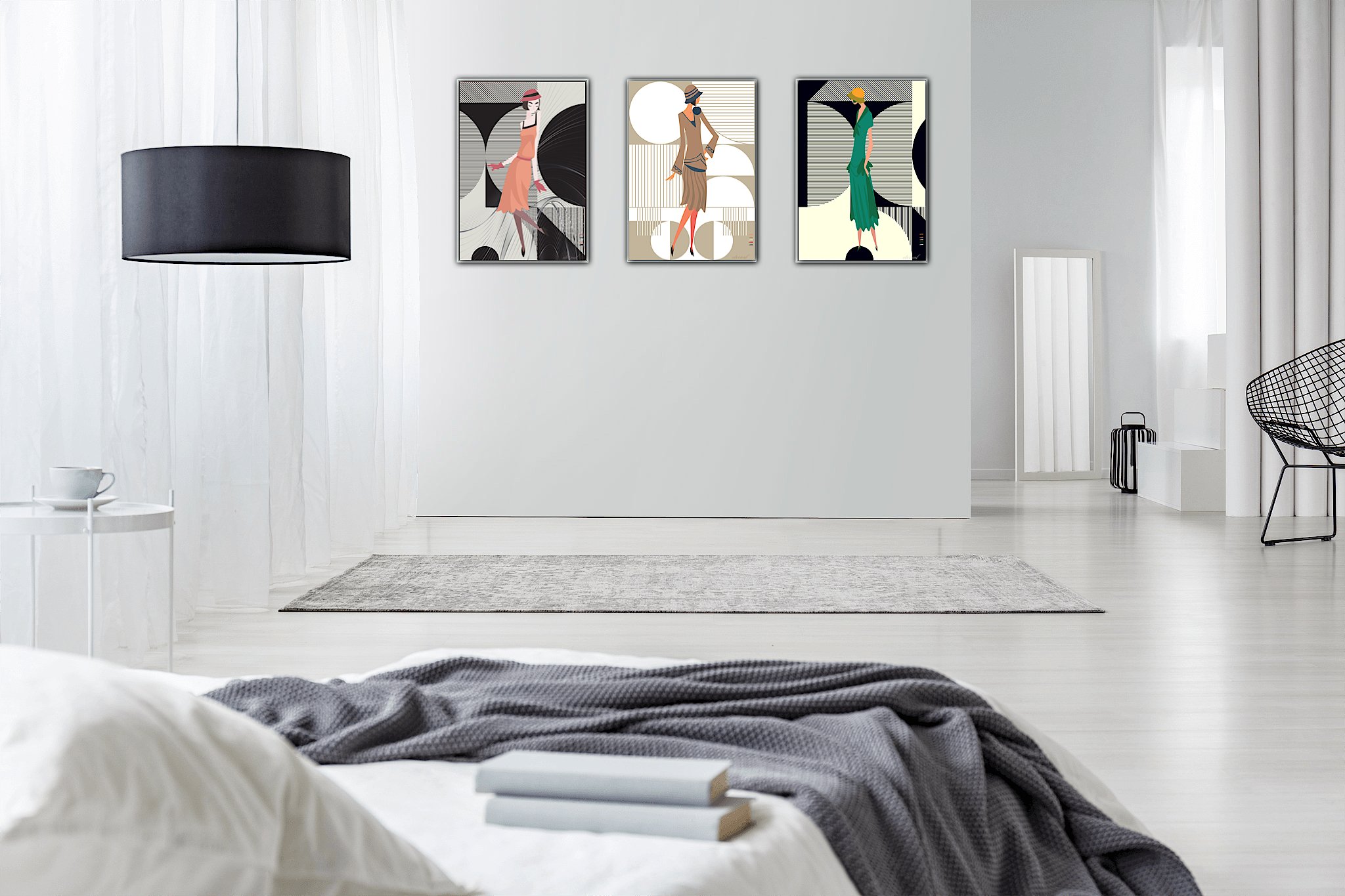 Modern bedroom with white walls and flooring, featuring three abstract fashion illustrations on the wall, a black floor lamp, a white bed with gray blanket, side table with cup, and a chair in the corner.