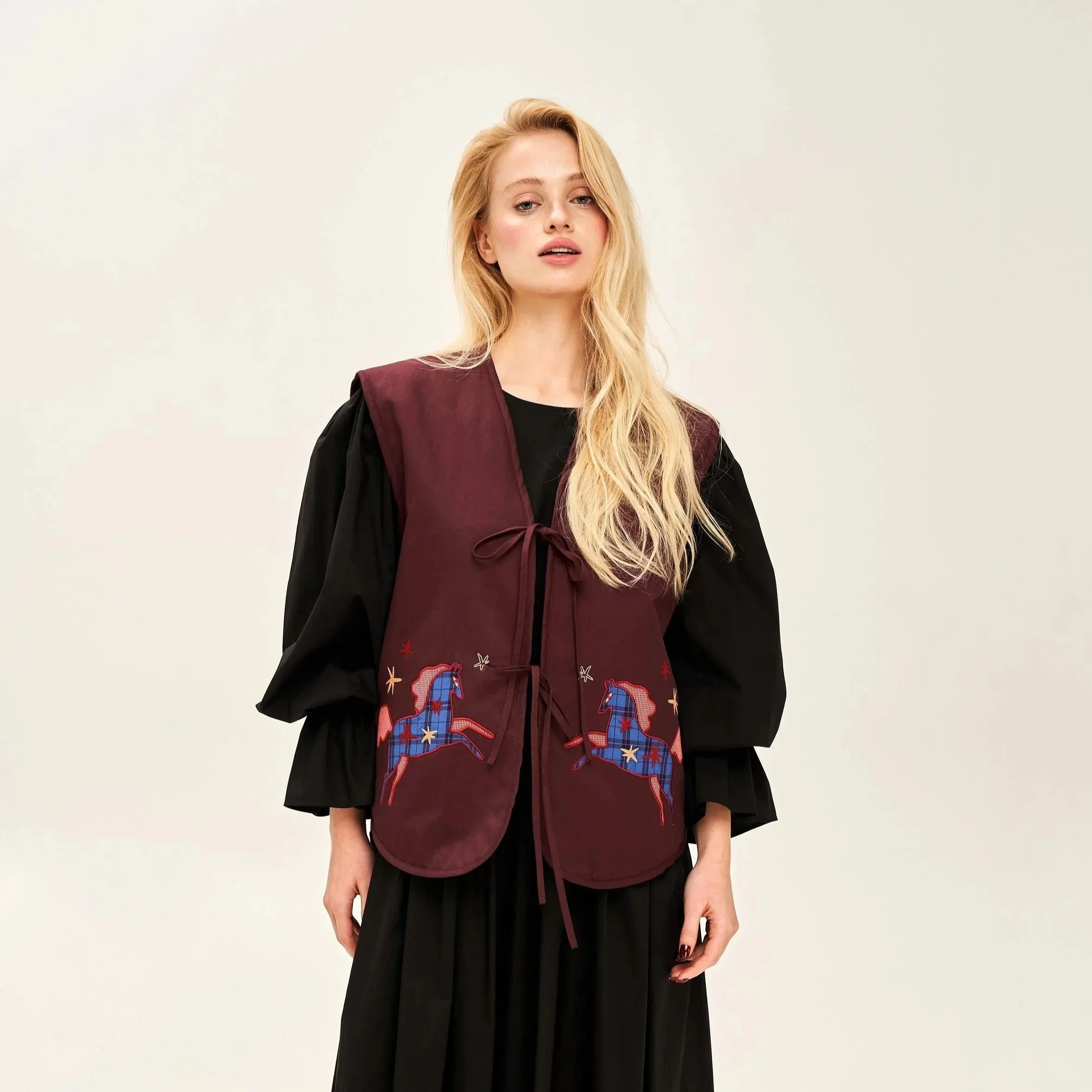 Quilted vest with applique Magic horse