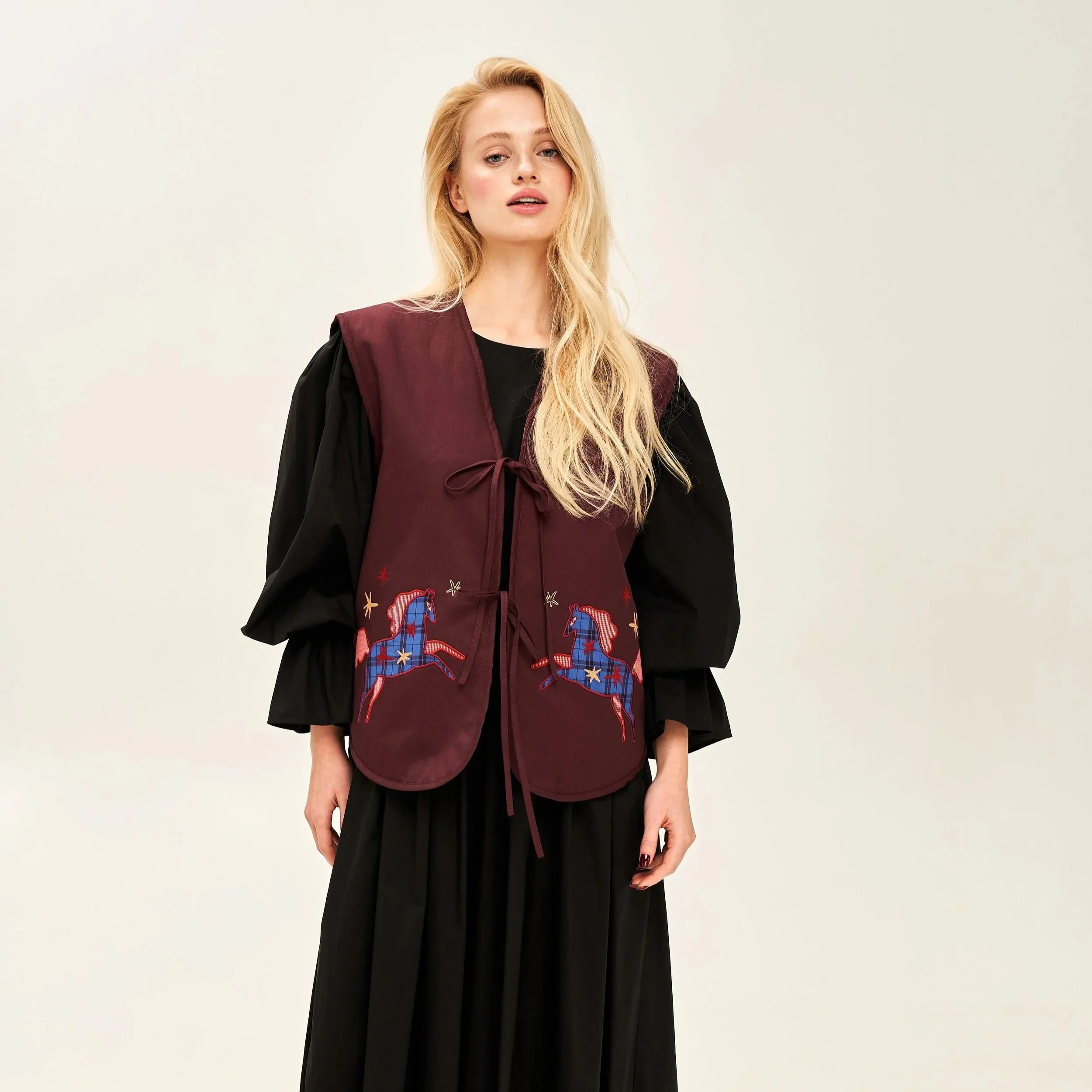 Quilted vest with applique Magic horse