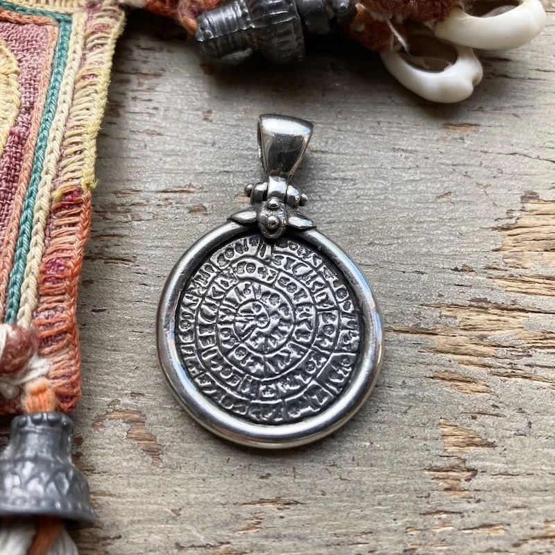 heavy vintage solid silver Phaistos disc pendant 2.jpeg
