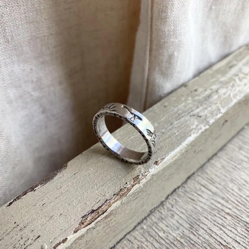 Southwestern sterling silver sun and animal ring 3.jpeg