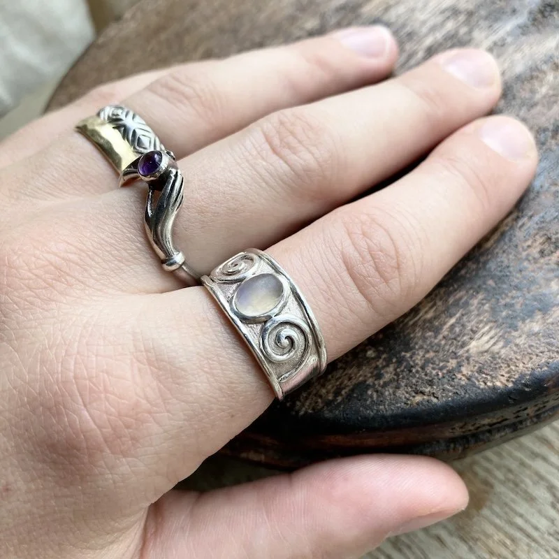 vintage solid silver swirly rainbow moonstone ring 4.jpeg