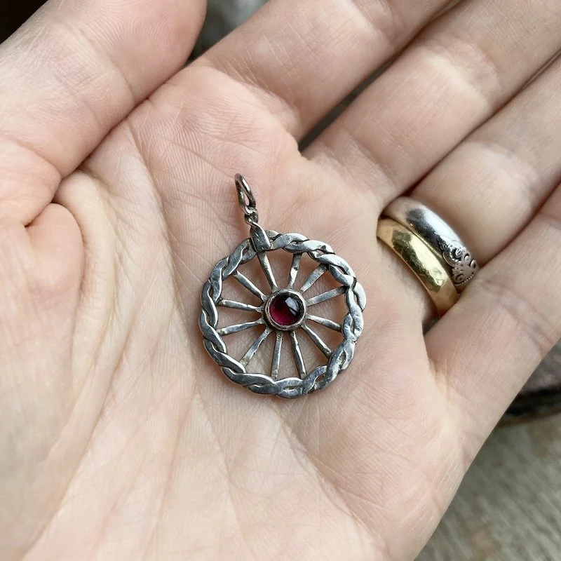 vintage sterling silver garnet wheel pendant 3.jpeg