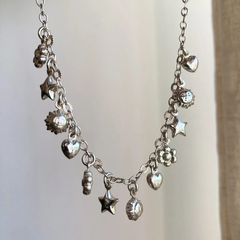 925 sterling silver heart, sun, star and flower charm necklace 1.jpeg