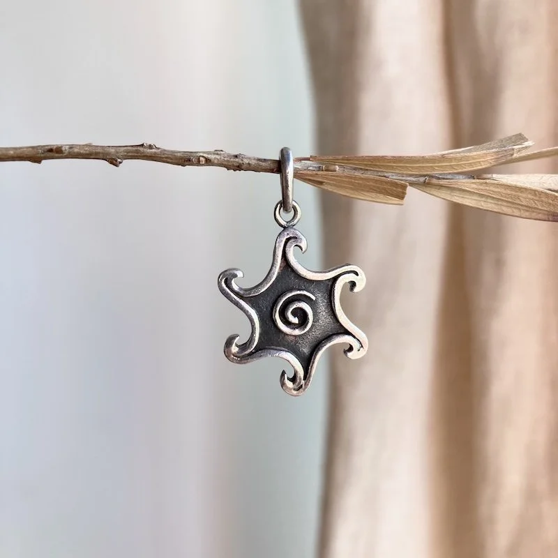 vintage sterling silver spiral sun pendant 4.jpeg