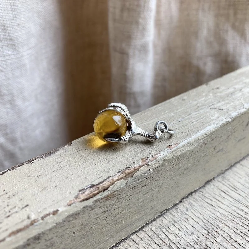 sterling silver claw and orb pendant 1.jpeg