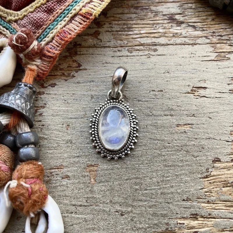 ornate sterling silver and rainbow moonstone pendant 1.jpeg