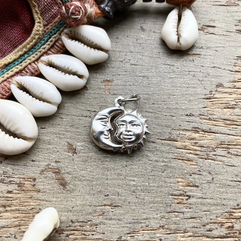 vintage sterling silver celestial sun and moon pendant 1.jpeg