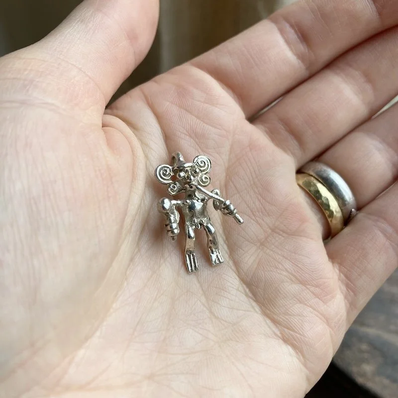 vintage sterling silver figure pendant 3.jpeg