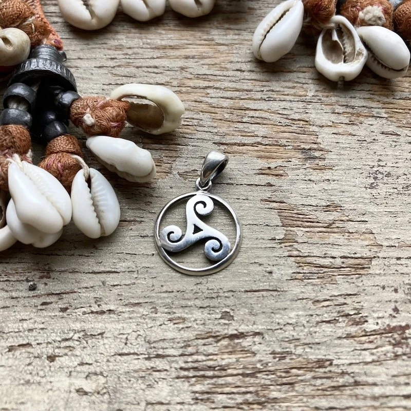 vintage sterling silver triskelion pendant 1.jpeg