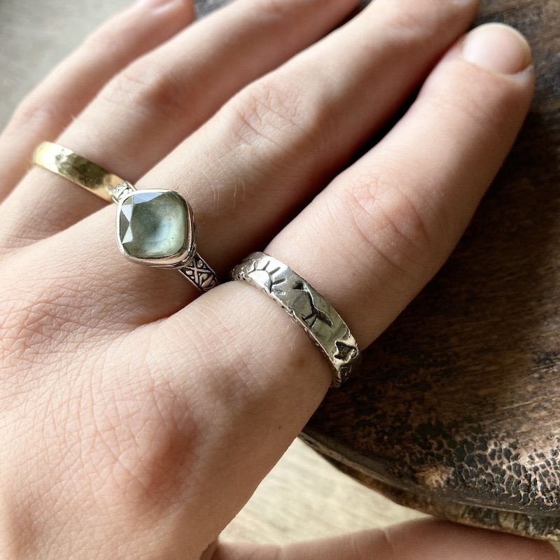 Southwestern sterling silver sun and animal ring 1.jpeg