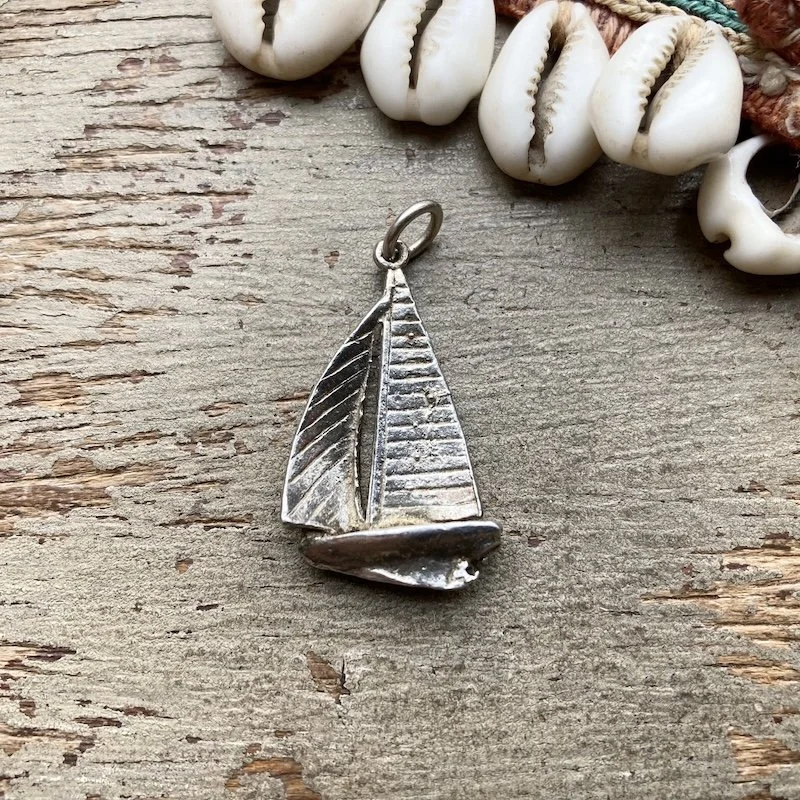 vintage sterling silver boat pendant.jpeg
