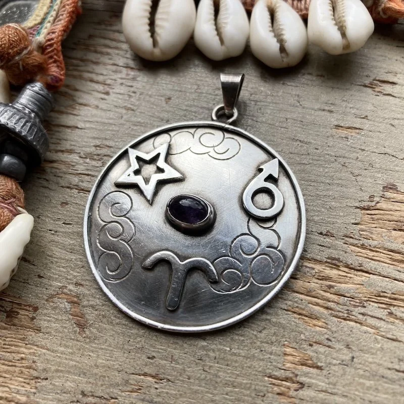 vintage sterling silver astrology pendant 2.jpeg