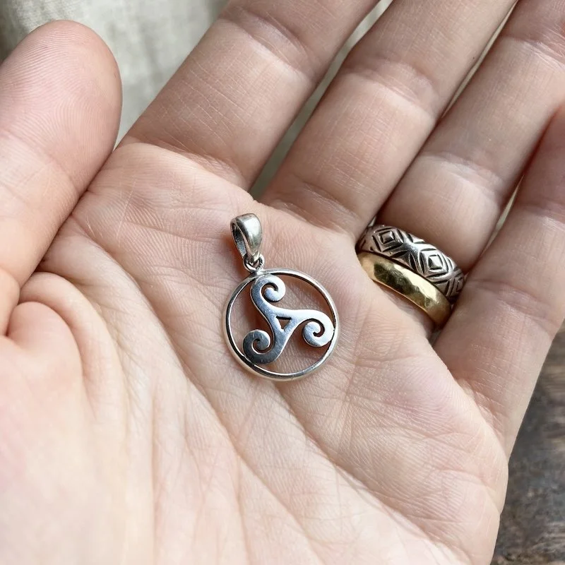 vintage sterling silver triskelion pendant 3.jpeg