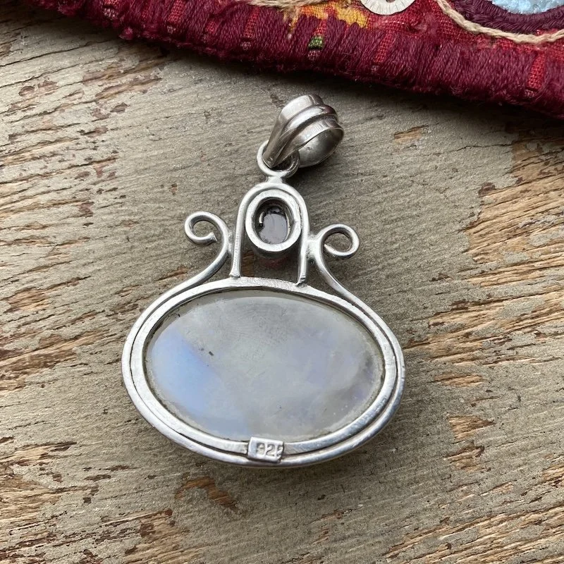 sterling silver rainbow moonstone and garnet pendant 3.jpeg
