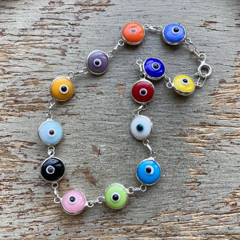 sterling silver and glass rainbow evil eye bracelet 1.jpeg