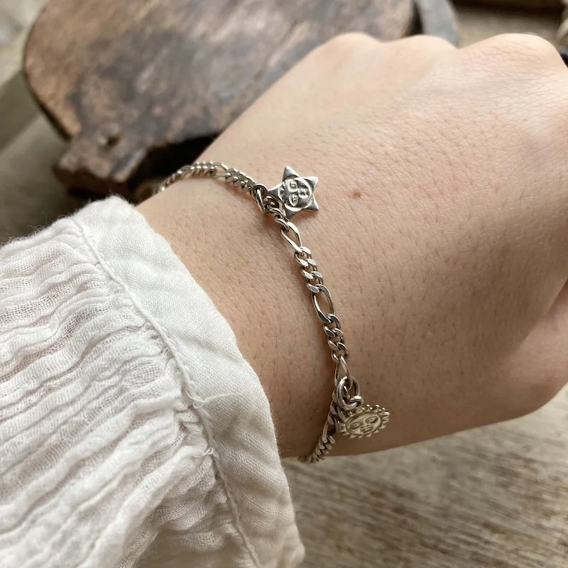 vintage sterling silver celestial charm bracelet.jpeg