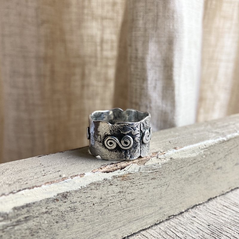 earthy textured solid silver swirly spiral ring 2.jpeg