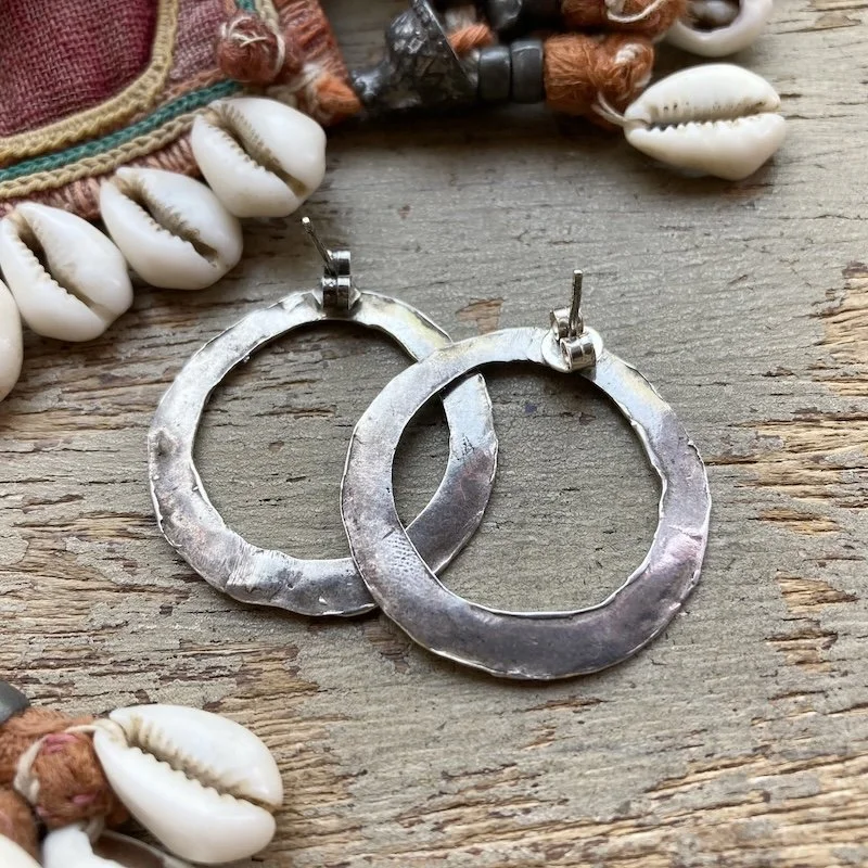 minimalist solid silver hammered circle earrings 2.jpeg