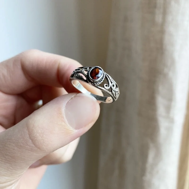 vintage ornate sterling silver and garnet ring 3.jpeg
