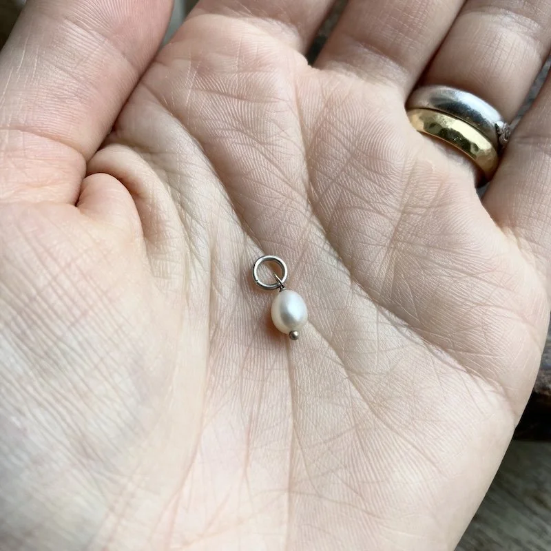 tiny little sterling silver and pearl pendant 3.jpeg
