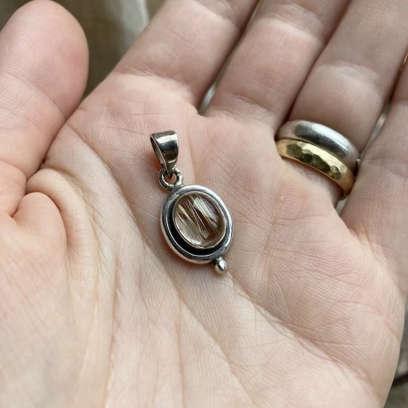 vintage sterling silver pendant.jpeg