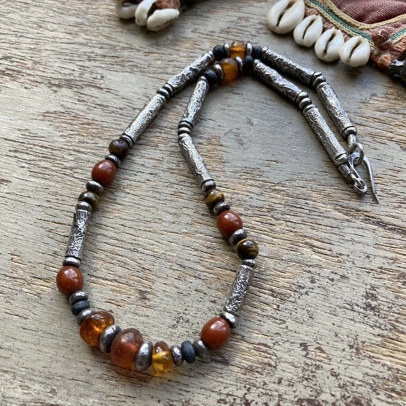 beautiful handmade textured silver and beaded necklace.jpeg