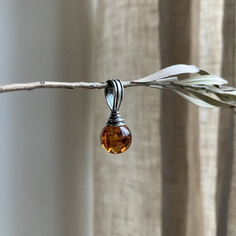 sterling silver and amber pendant.jpeg