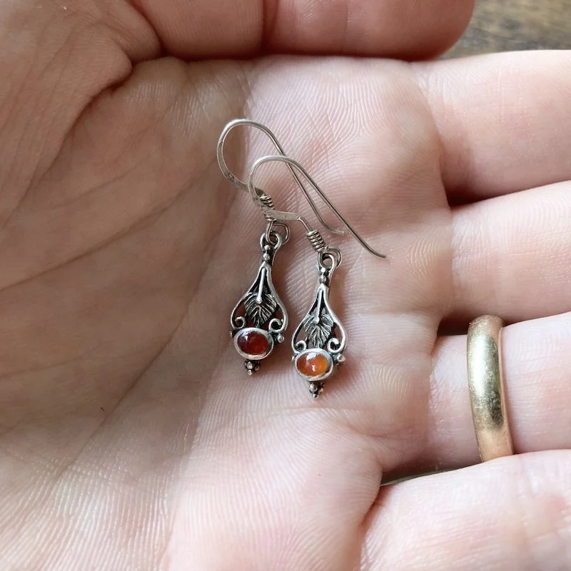 ornate sterling silver earrings with inlaid carnelian 4.jpeg