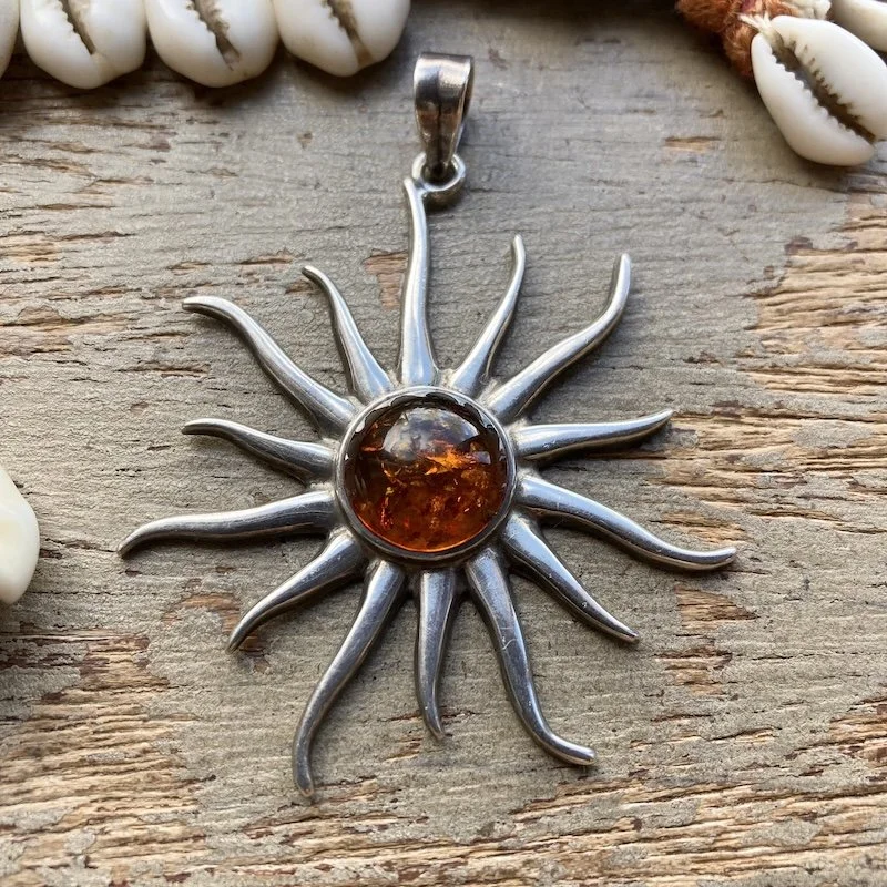 sterling silver and amber sun pendant 1.jpeg