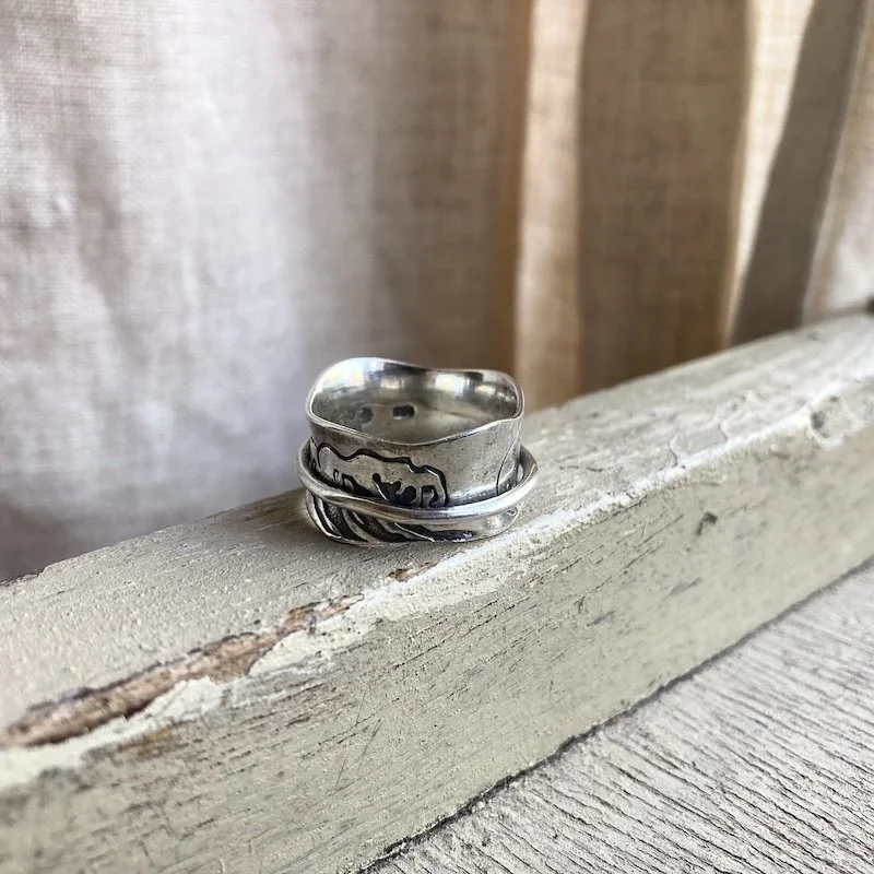 sterling silver earthy spinner ring 2.jpeg
