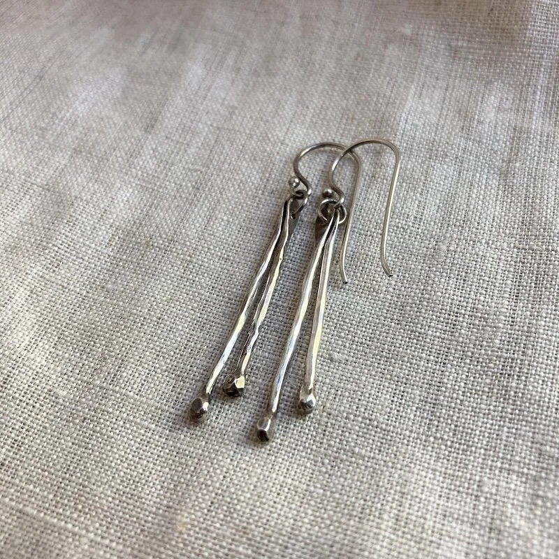 hammered solid silver dangly earrings 2.jpeg