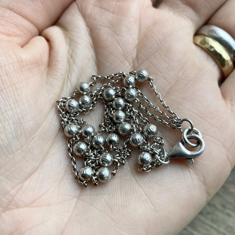 vintage sterling silver triple stranded bracelet 3.jpeg