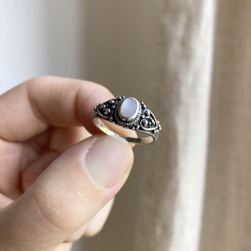 ornate sterling silver and mother of pearl ring 1.jpeg
