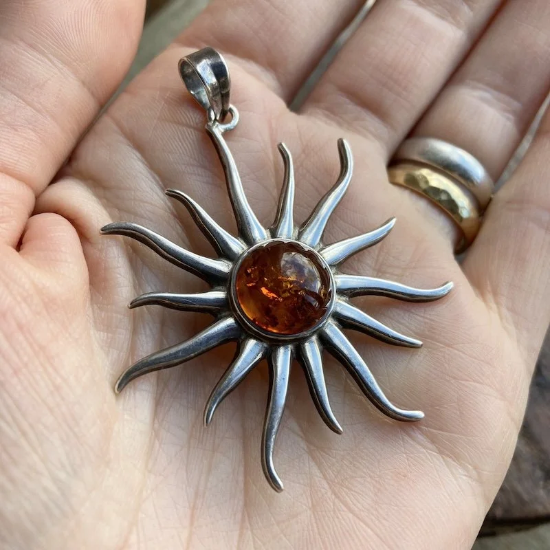 sterling silver and amber sun pendant 4.jpeg