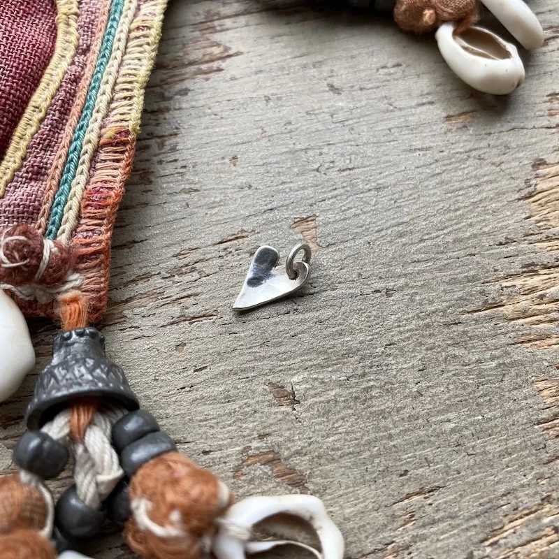 tiny sterling silver heart pendant 2.jpeg