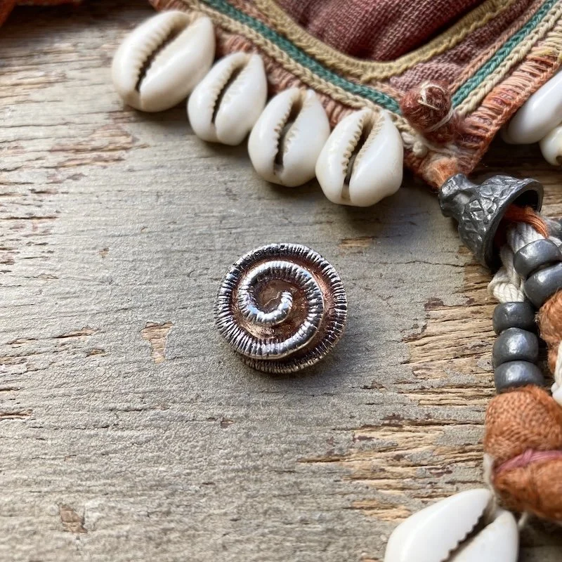 little solid silver spiral pendant.jpeg