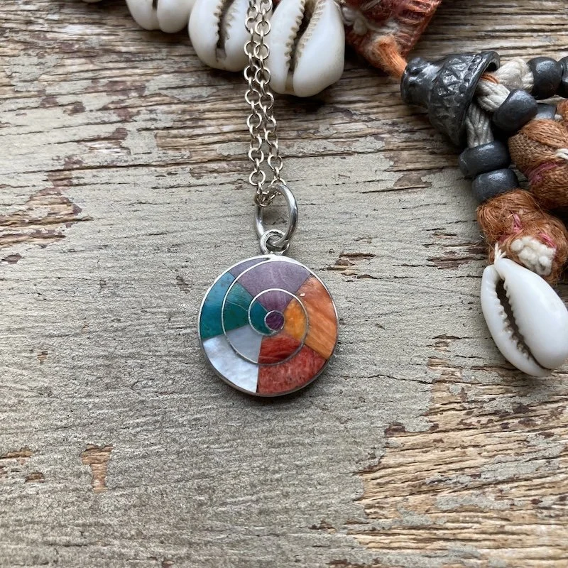 Peruvian 950 silver inlaid rainbow spiral necklace 4.jpeg