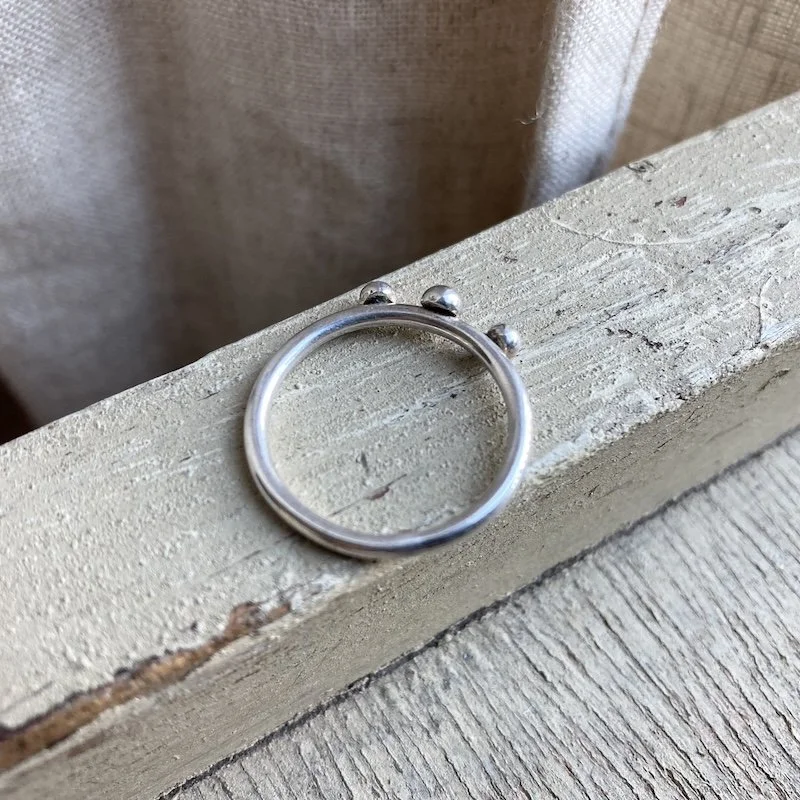 simple sterling silver dot band ring. 2.jpeg