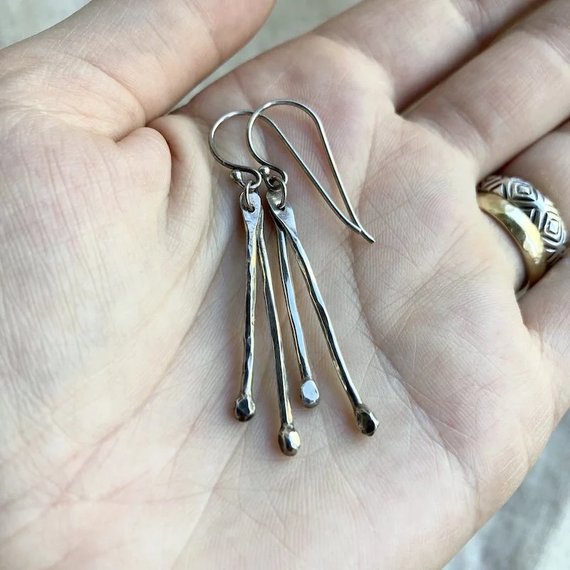 hammered solid silver dangly earrings 4.jpeg