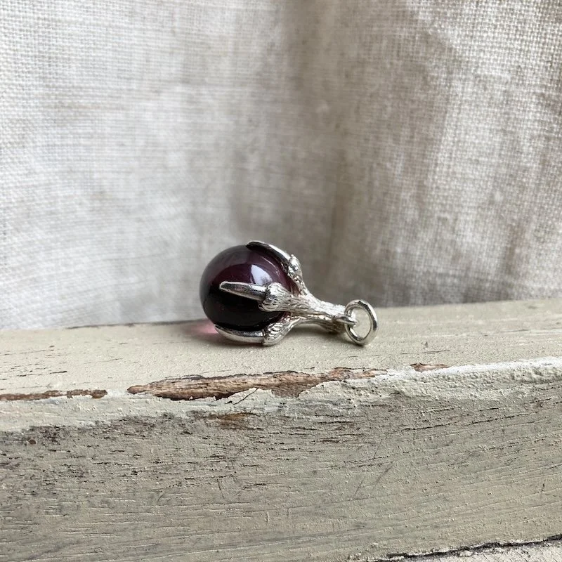 vintage sterling silver claw and orb pendant 1.jpeg