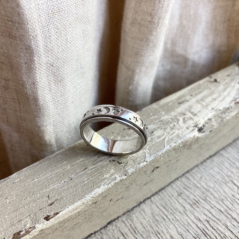 sterling silver celestial spinner ring 1.jpeg