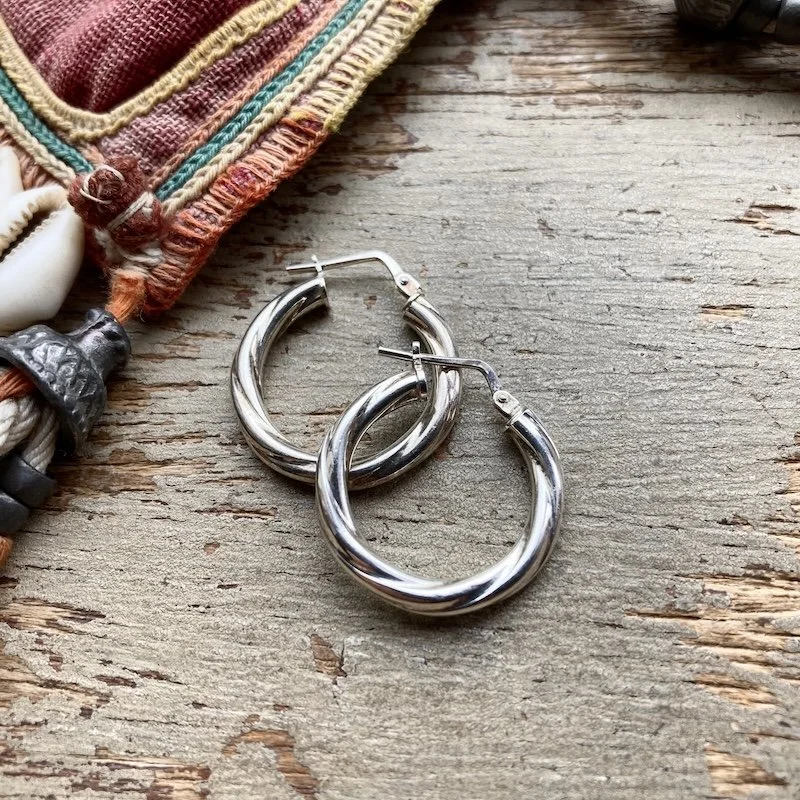 vintage sterling silver twist hoops 2.jpeg